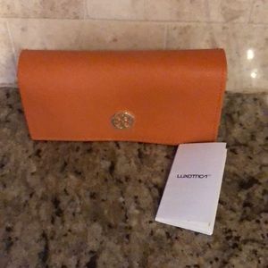 NWOT Tory Burch sunglasses case.